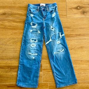 Girl Abercrombie  high rise wide leg jeans in light wash.